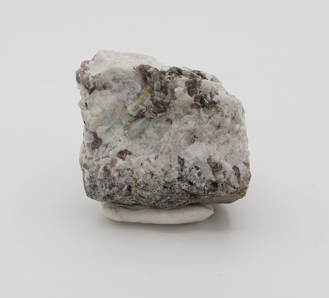 Aquamarine with Mica, Hematite, and Smoky Quartz on Feldspar