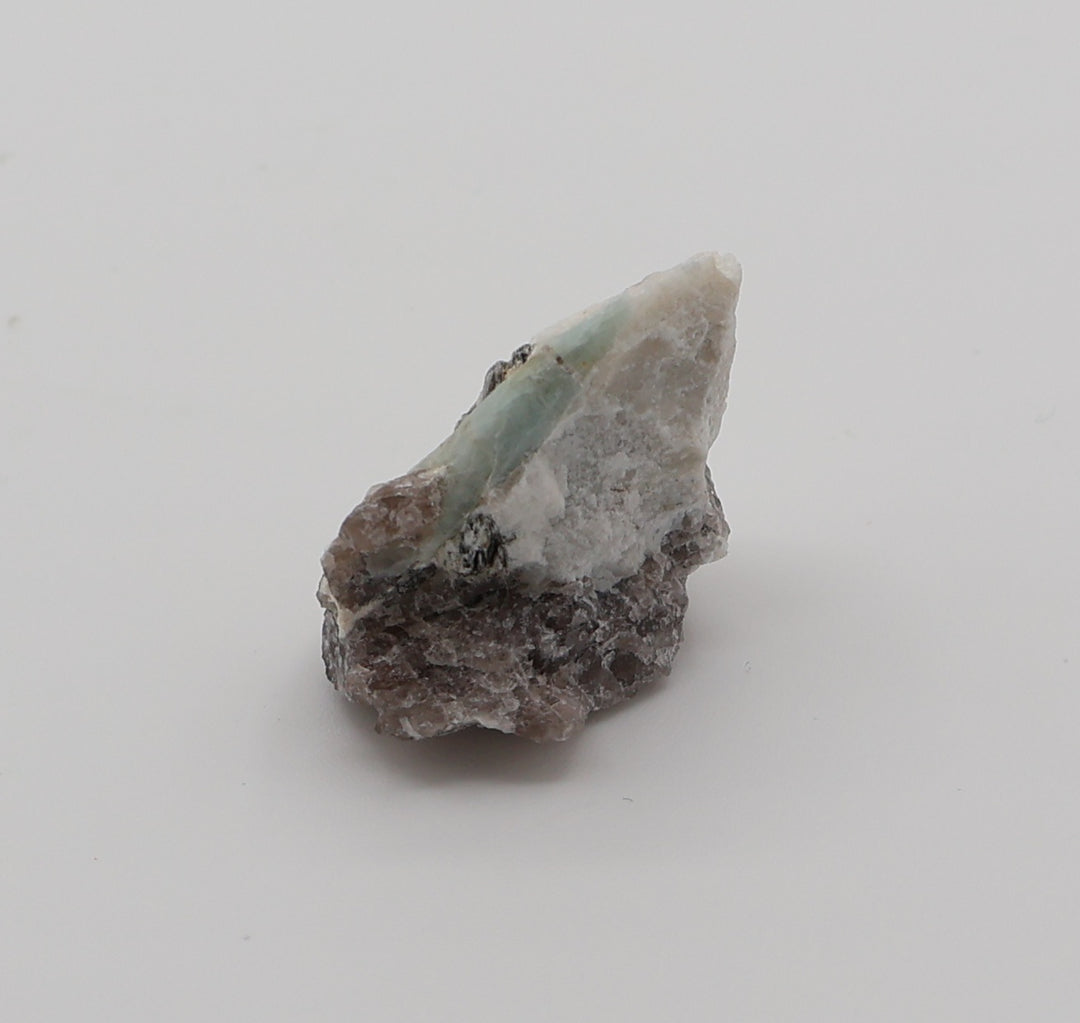 Aquamarine with Mica on Smoky Quartz and Feldspar