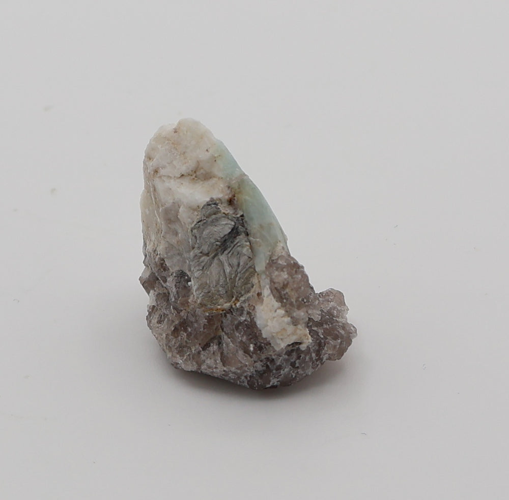 Aquamarine with Mica on Smoky Quartz and Feldspar