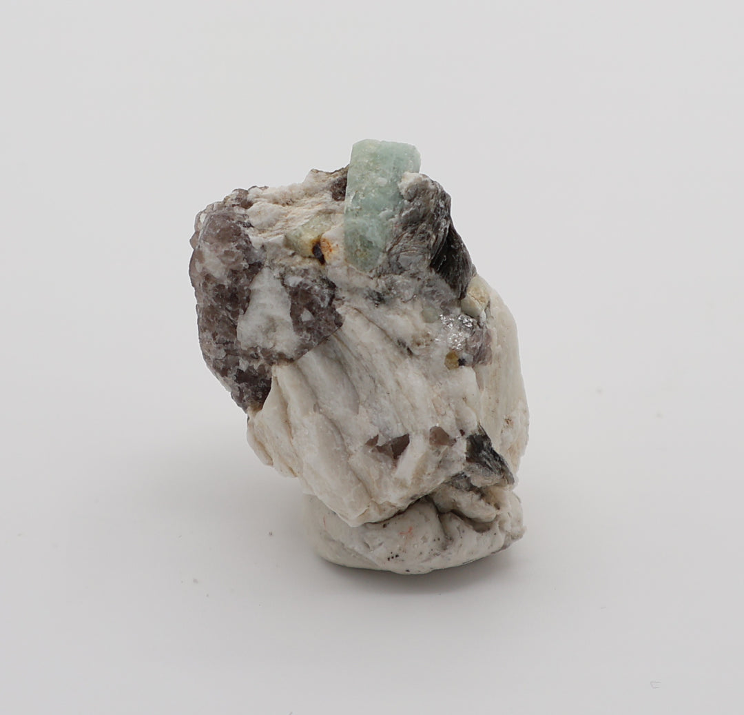 Aquamarine with Mica, Hematite, on Smoky Quartz and Feldspar