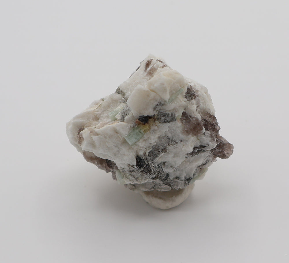 Aquamarine and Bi-Colour Beryl with Hematite, Mica, Smoky Quartz, on Feldspar