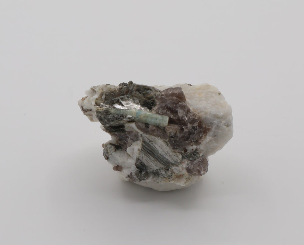 Aquamarine with Mica on Smoky Quartz and Feldspar