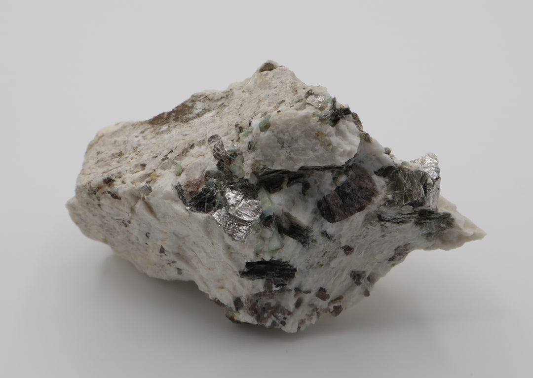 Aquamarine cluster with Mica and Smoky Quartz on Feldspar