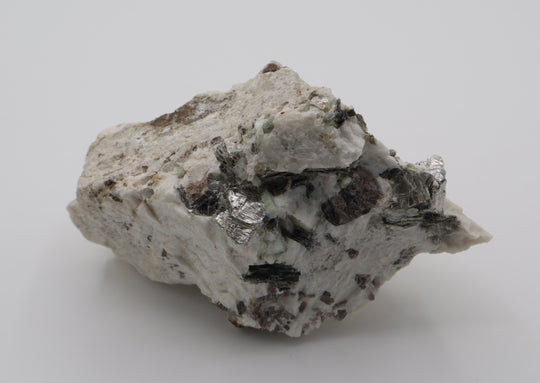 Aquamarine cluster with Mica and Smoky Quartz on Feldspar