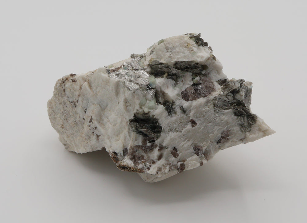 Aquamarine cluster with Mica and Smoky Quartz on Feldspar