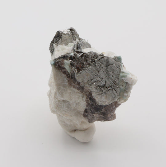 Aquamarine and Bi-Colour Beryl with Mica, Smoky Quartz, on Feldspar