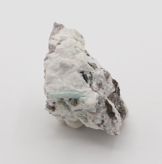 Aquamarine and Bi-Colour Beryl with Hematite, Mica, Smoky Quartz, on Feldspar
