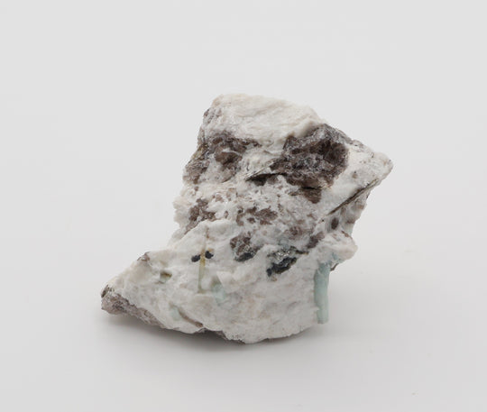 Aquamarine and Bi-Colour Beryl with Hematite, Mica, Smoky Quartz, on Feldspar