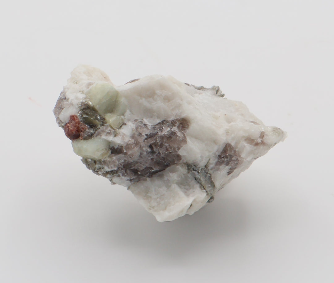 Aquamarine and Spessartine Garnet with Mica, on Smoky Quartz and Feldspar