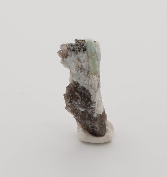 Aquamarine with Mica on Smoky Quartz and Feldspar