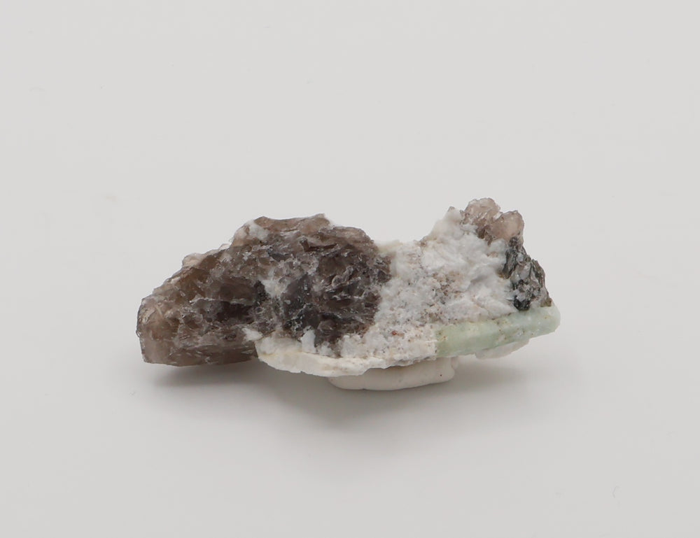 Aquamarine with Mica on Smoky Quartz and Feldspar