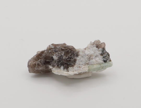 Aquamarine with Mica on Smoky Quartz and Feldspar