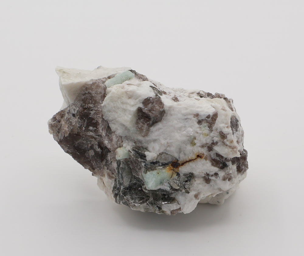 Aquamarine and Bi-Colour Beryl with Mica, Hematite, on Smoky Quartz and Feldspar