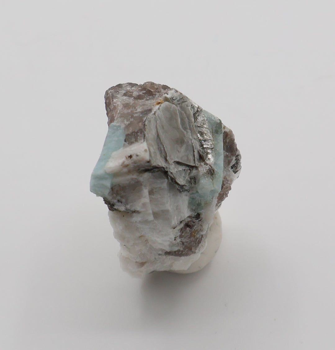Aquamarine with Mica on Smoky Quartz and Feldspar