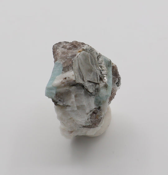 Aquamarine with Mica on Smoky Quartz and Feldspar