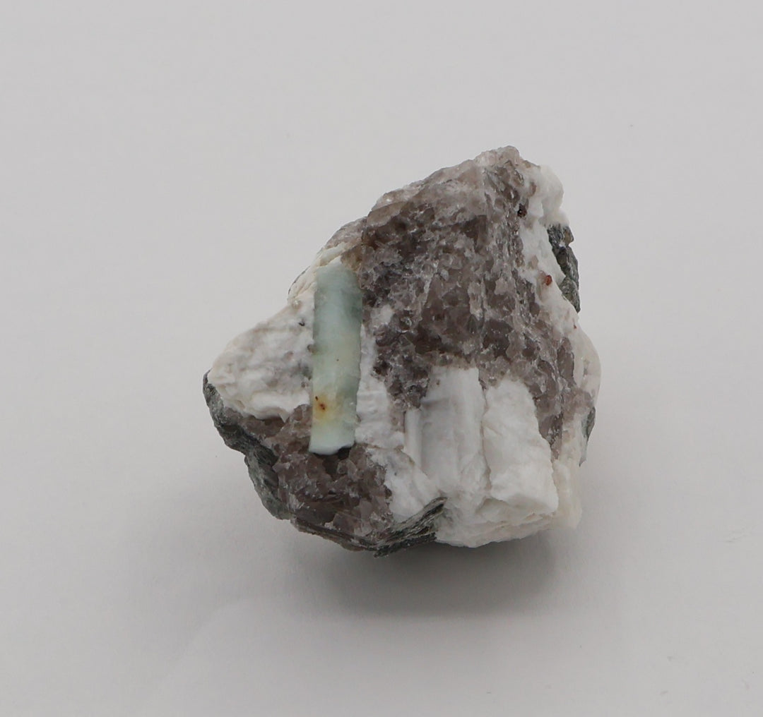 Aquamarine with Mica and Spessartine Garnet on Smoky Quartz and Feldspar