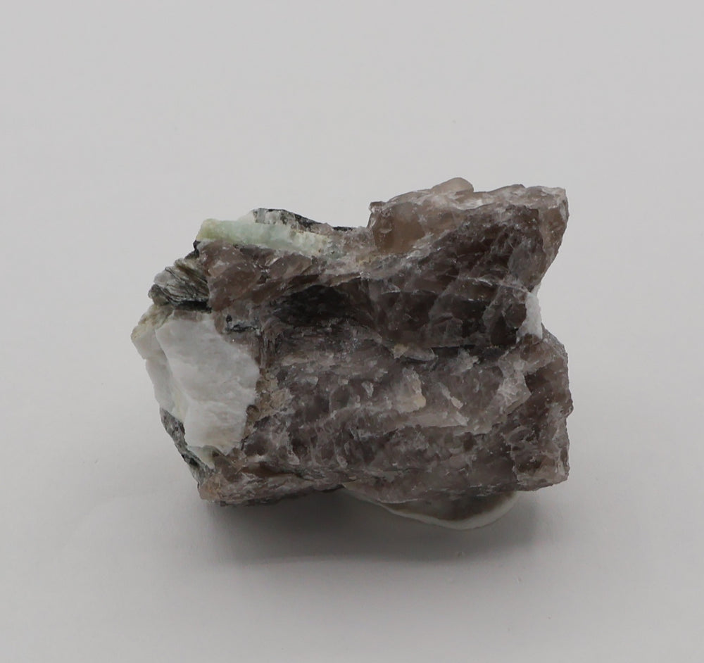 Aquamarine with Mica on Smoky Quartz and Feldspar