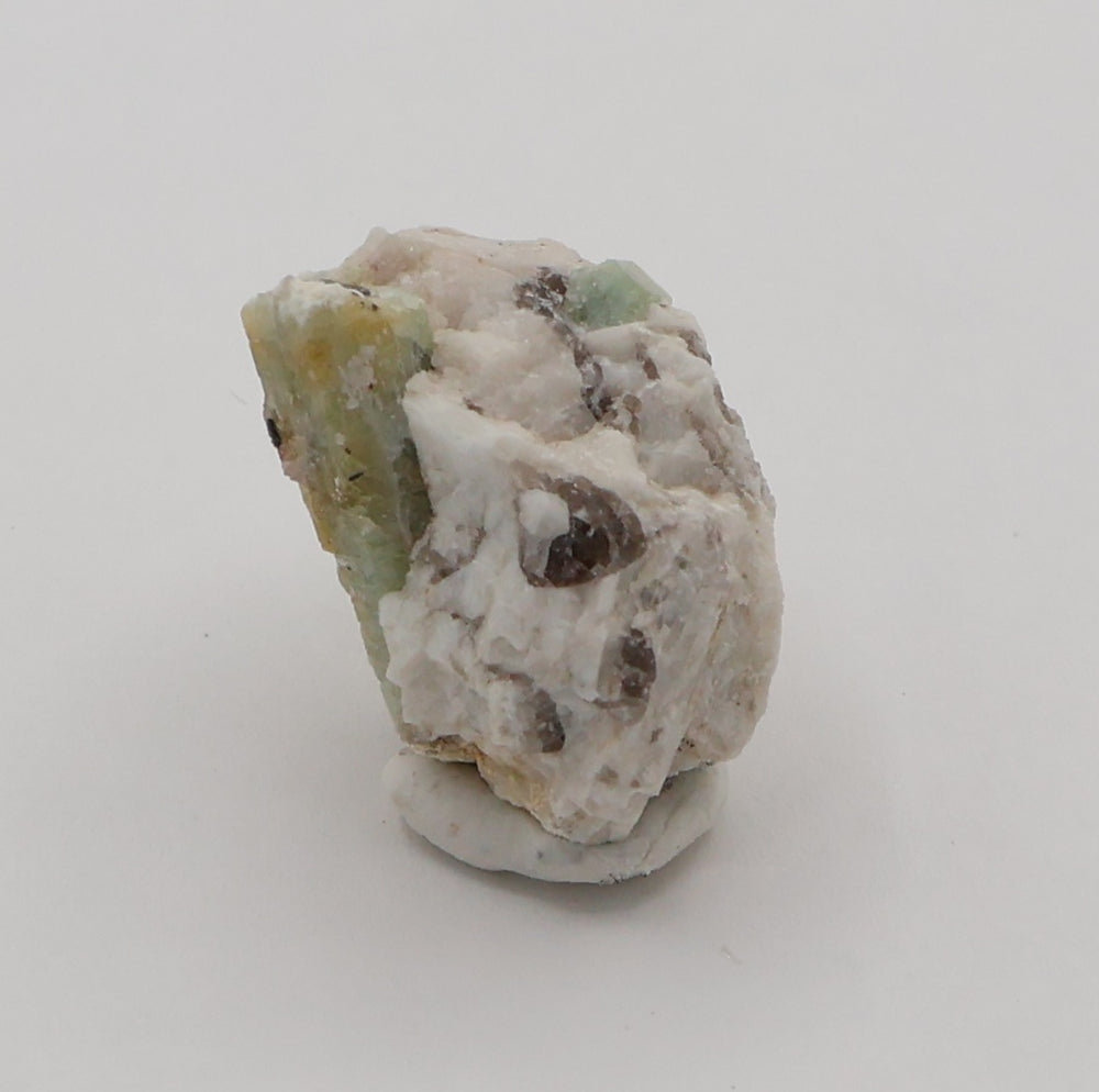 Bi-Colour Beryl and Aquamarine with Hematite and Smoky Quartz on Feldspar