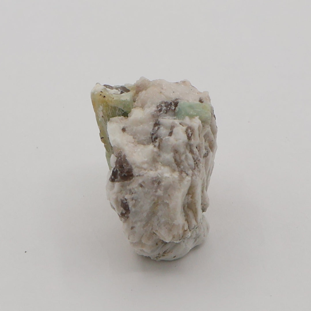 Bi-Colour Beryl and Aquamarine with Hematite and Smoky Quartz on Feldspar