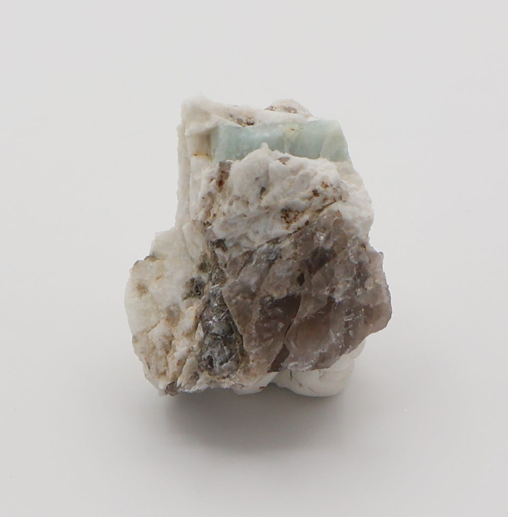 Aquamarine with Mica on Smoky Quartz and Feldspar