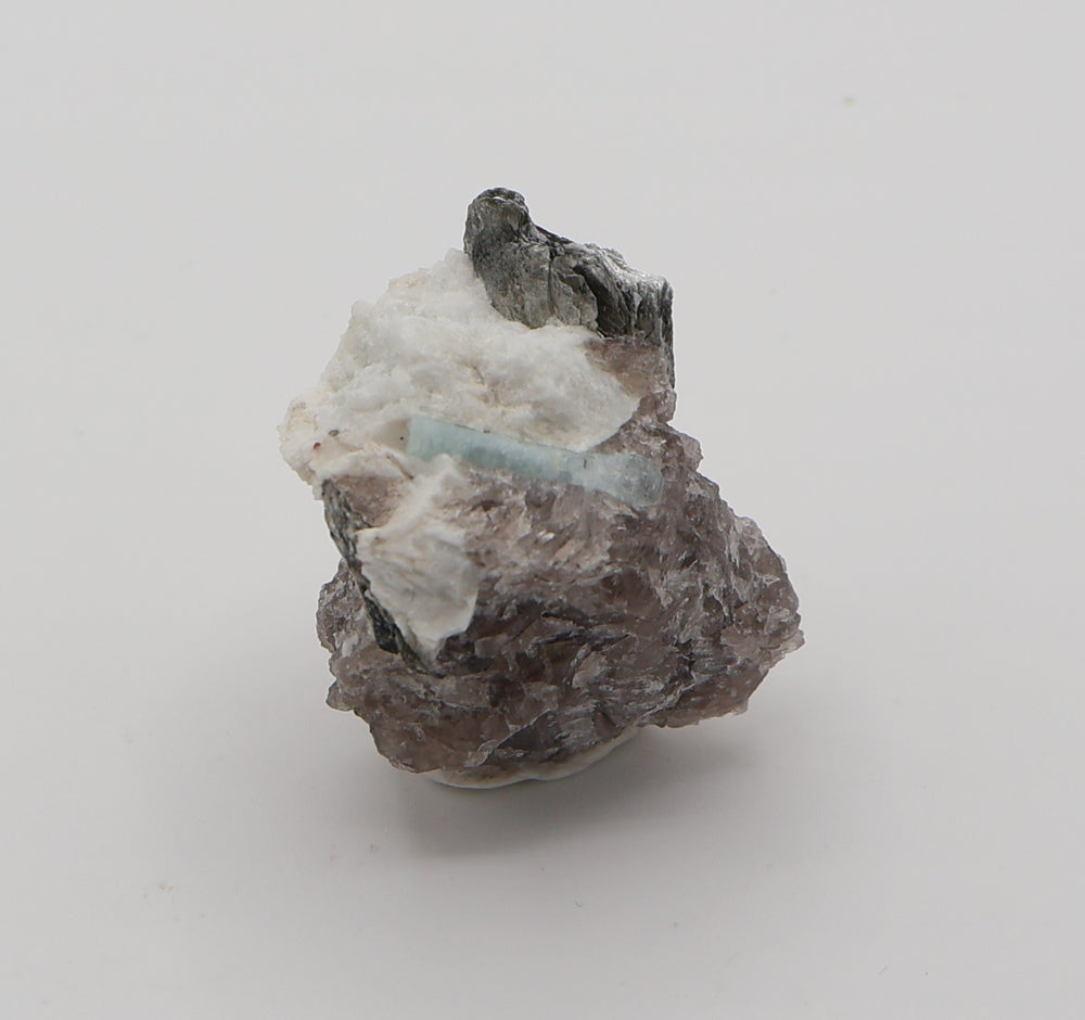 Aquamarine with Mica on Smoky Quartz and Feldspar