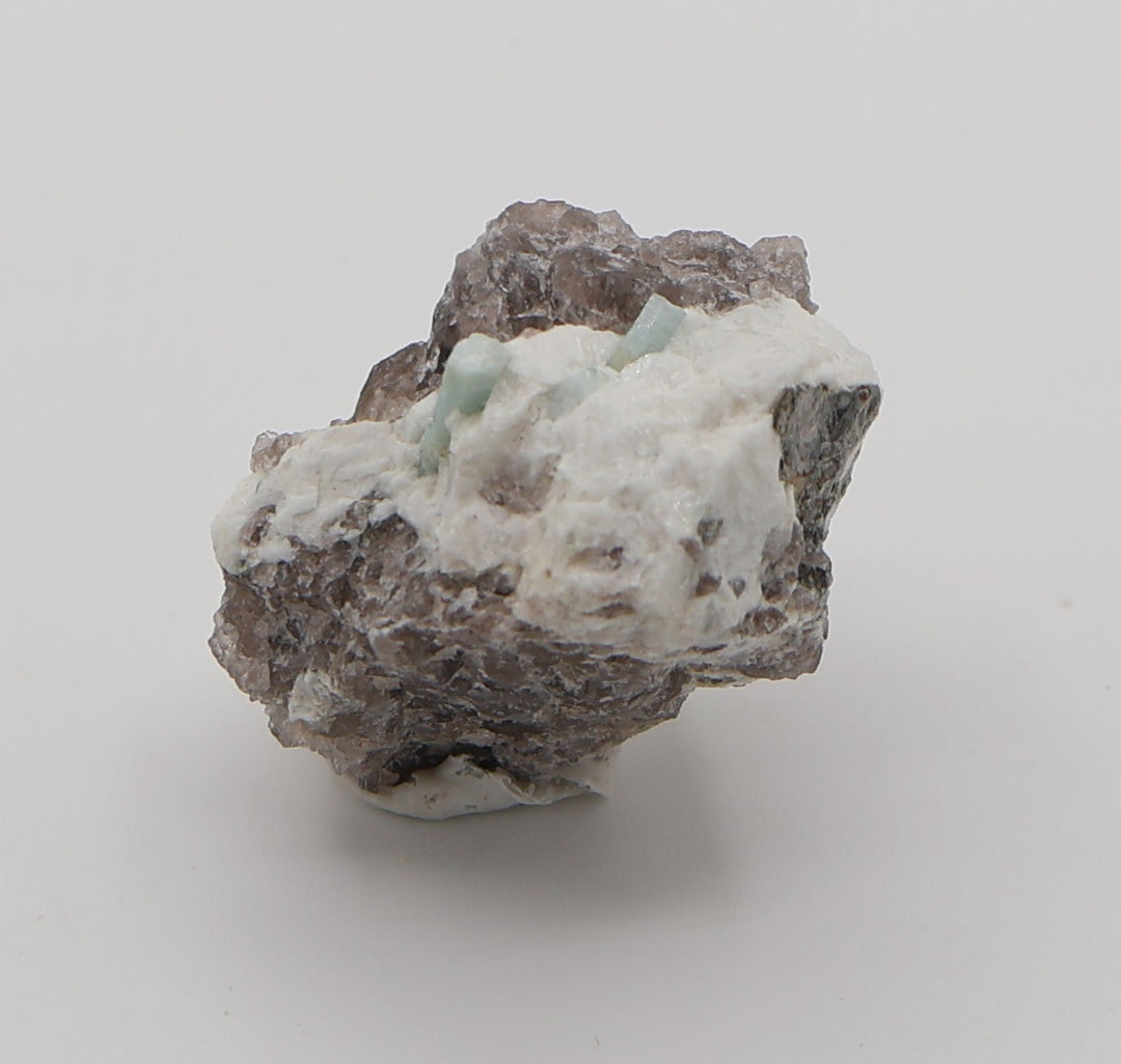 Aquamarine with Mica on Smoky Quartz and Feldspar