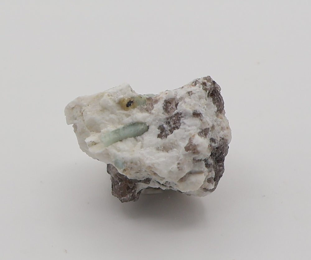 Aquamarine and Bi-Colour Beryl with Hematite on Smoky Quartz and Feldspar
