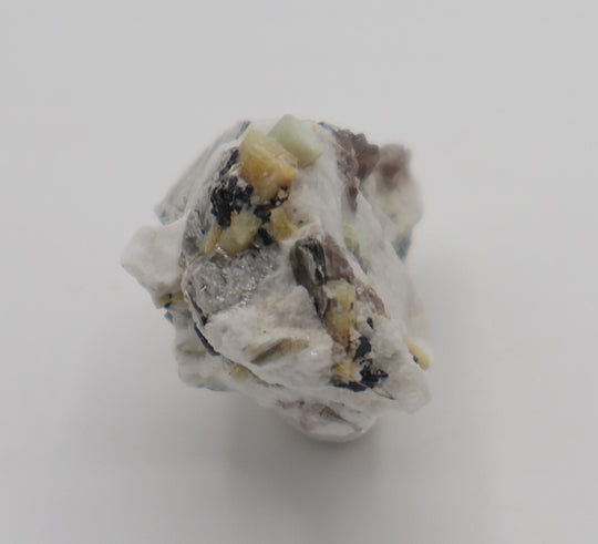 Aquamarine and Heliodor with Hematite, Mica, Smoky Quartz, on Feldspar