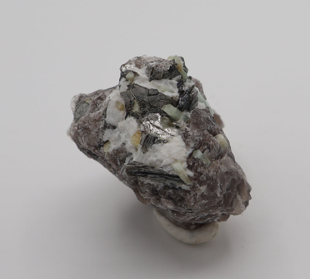 Aquamarine Cluster with Mica on Smoky Quartz and Feldspar