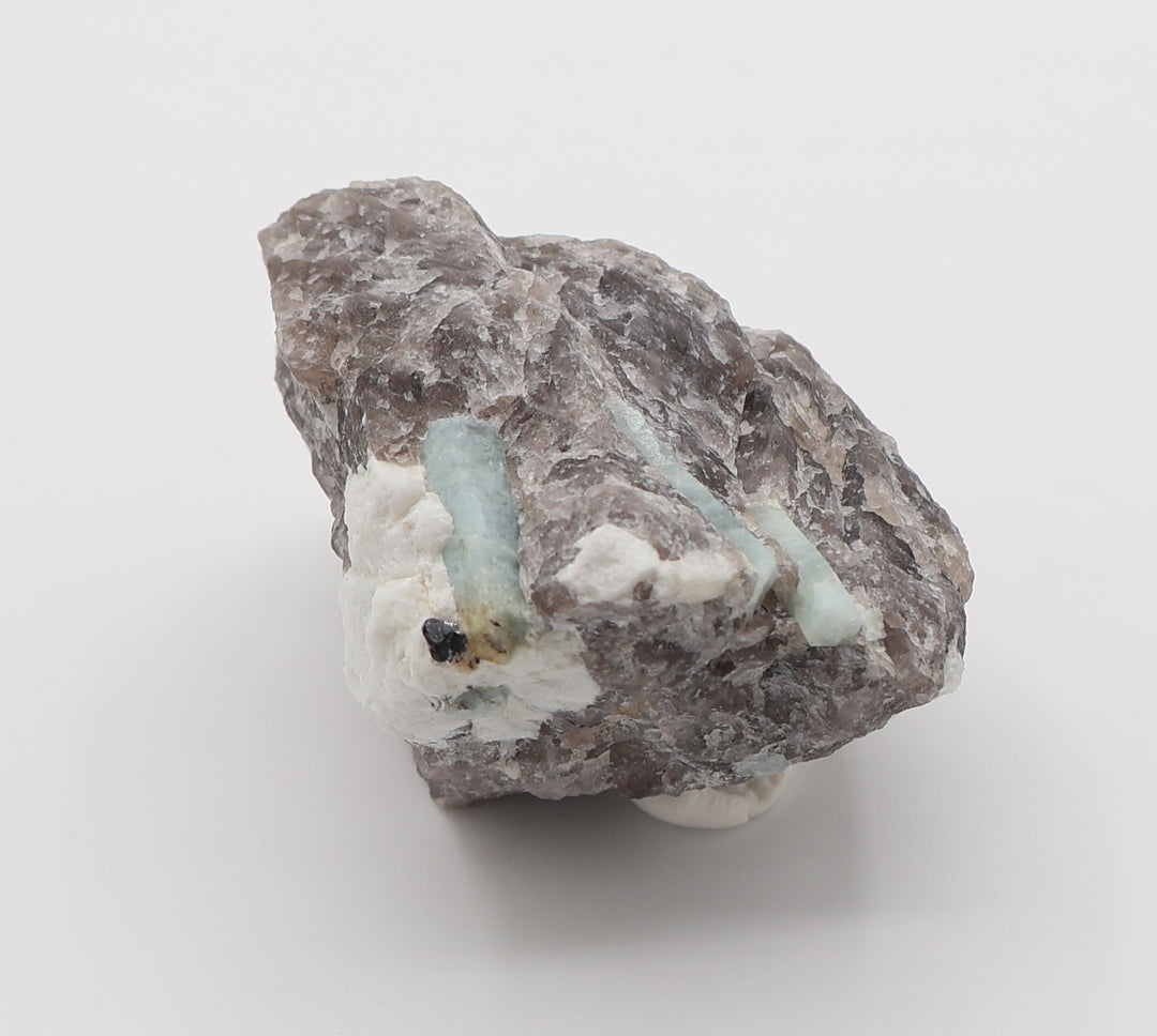 Aquamarine with Hematite and Feldspar on Smoky Quartz