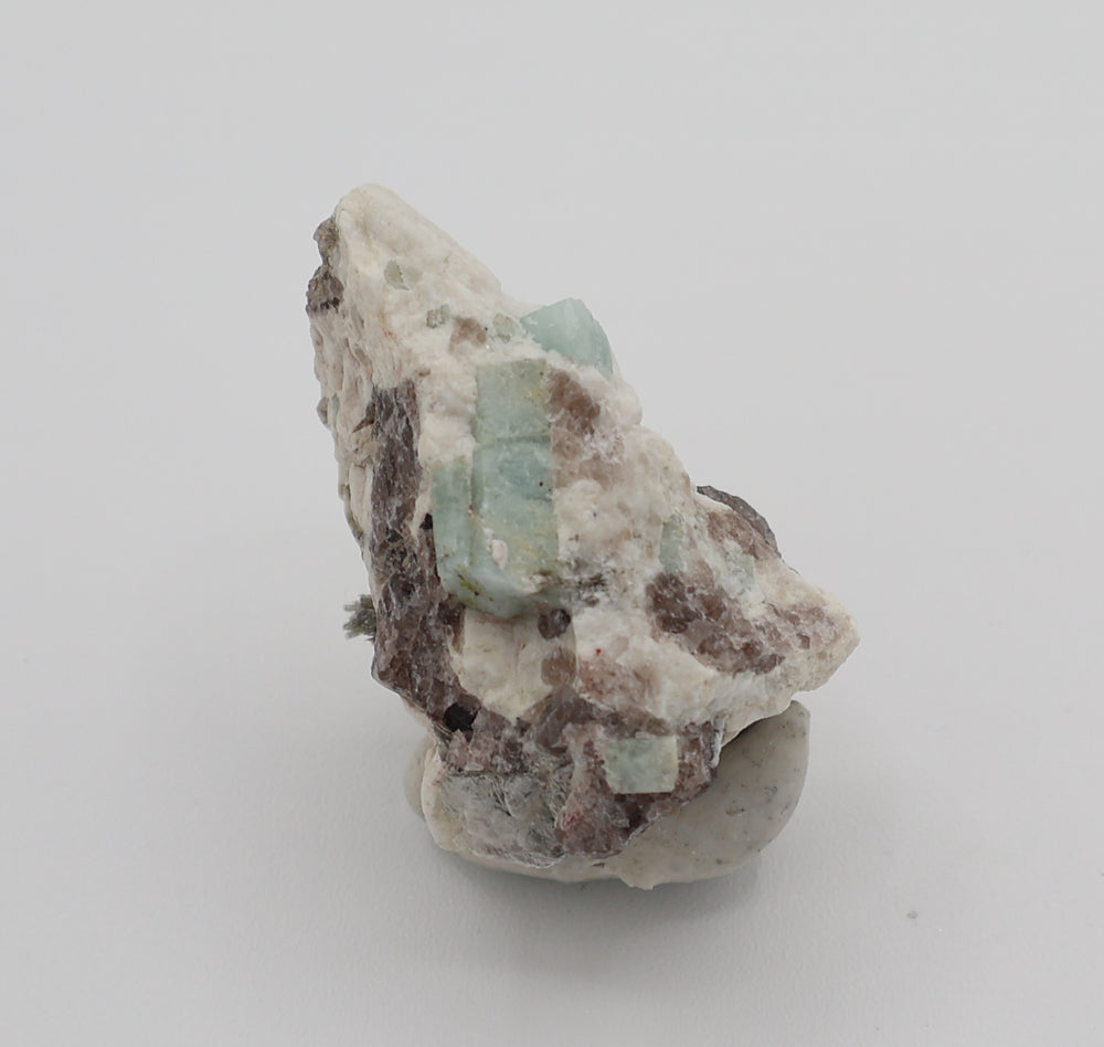 Aquamarine with Mica on Smoky Quartz and Feldspar