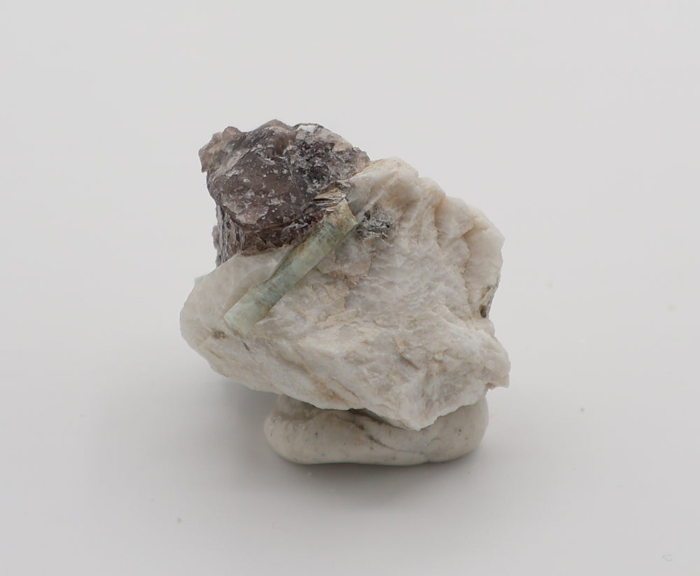 Aquamarine with Mica, Hematite, on Smoky Quartz and Feldspar