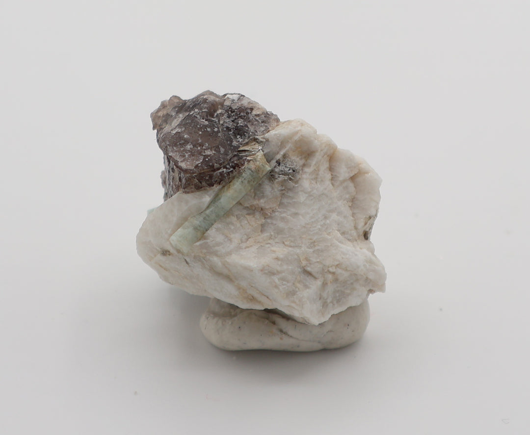 Aquamarine with Mica, Hematite, on Smoky Quartz and Feldspar