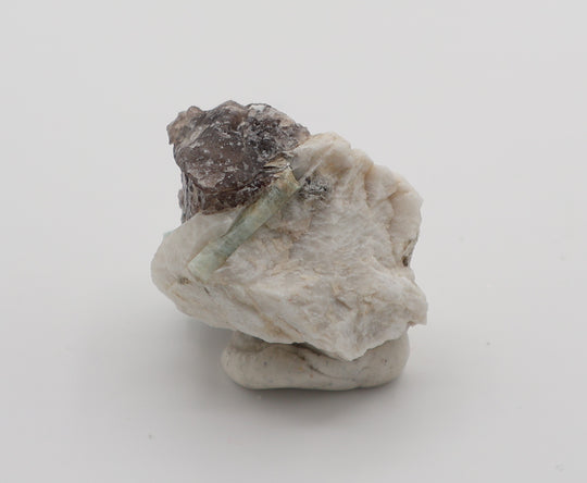 Aquamarine with Mica, Hematite, on Smoky Quartz and Feldspar