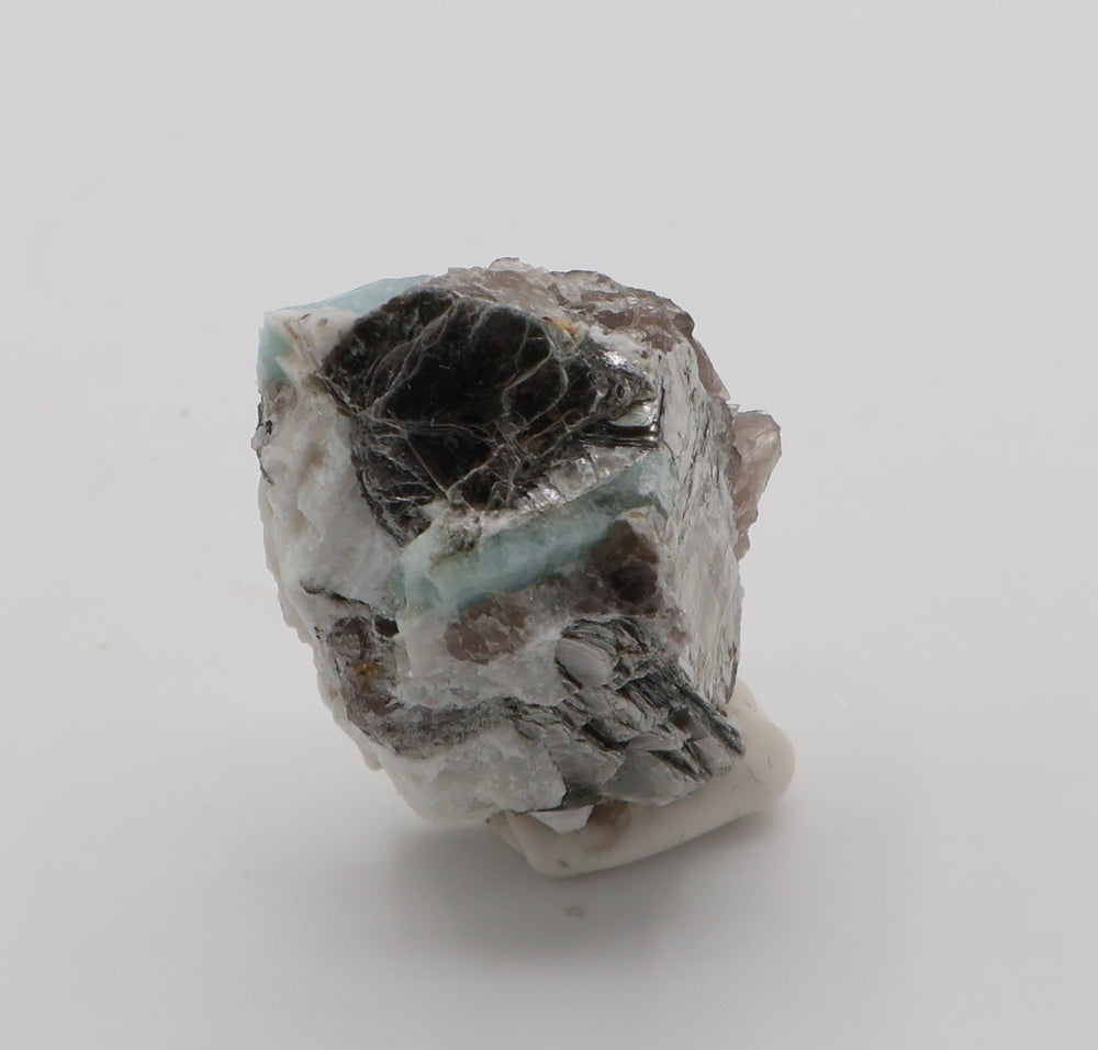 Aquamarine with Mica on Smoky Quartz and Feldspar