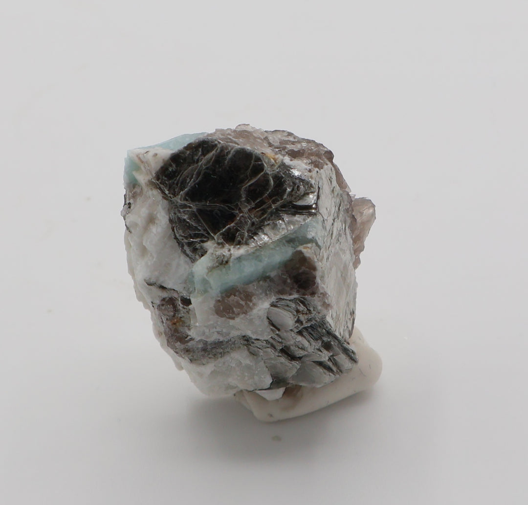 Aquamarine with Mica on Smoky Quartz and Feldspar