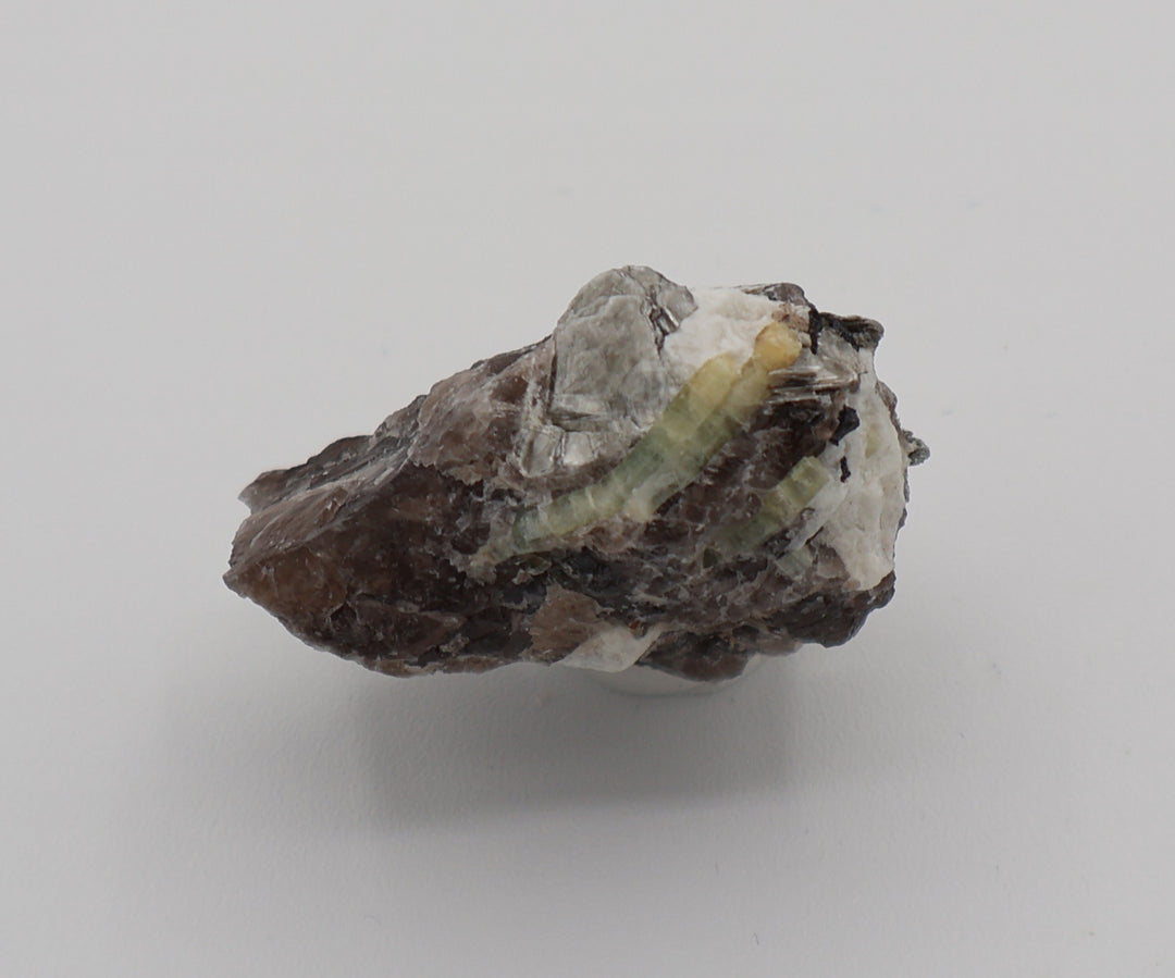 Heliodor Capped Aquamarine with Mica, Hematite, on Smoky Quartz and Feldspar