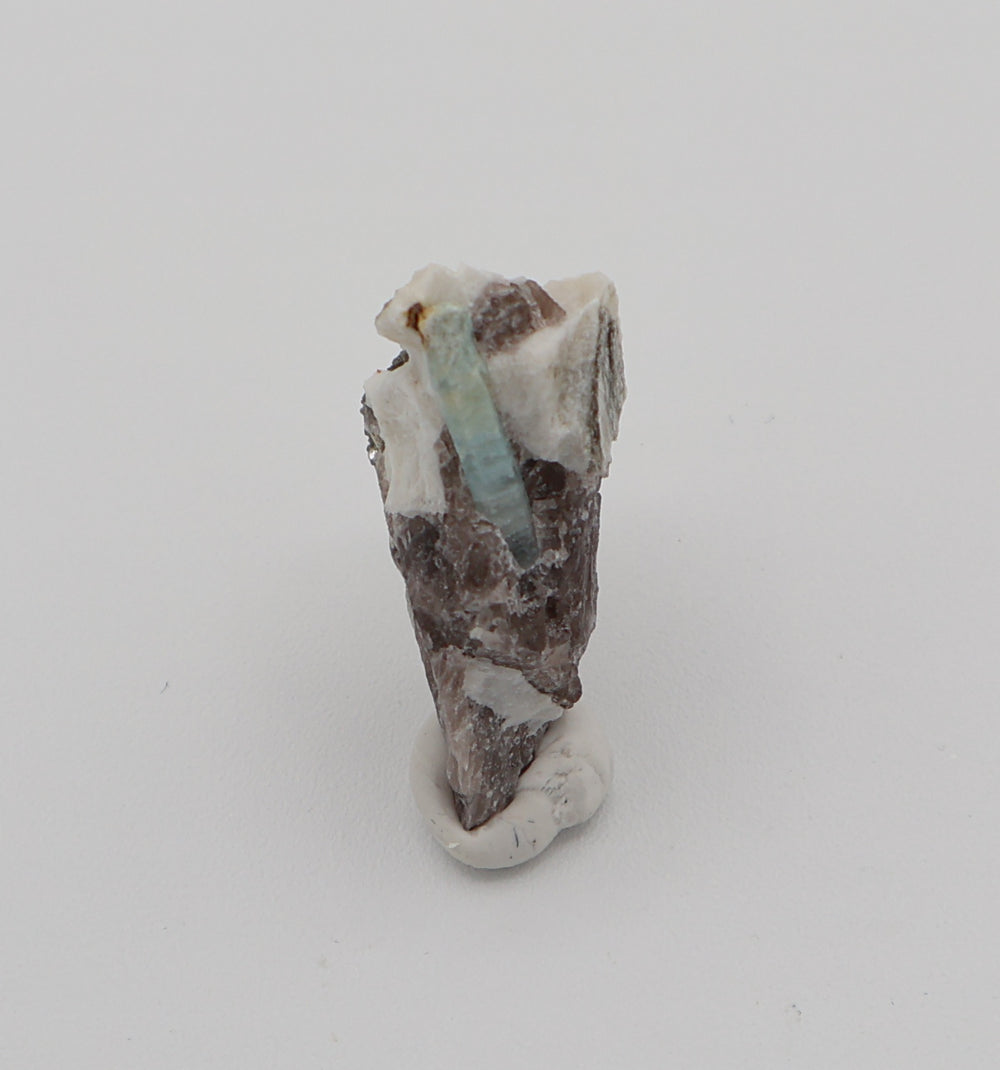 Aquamarine with Hematite, Mica, On Smoky Quartz and Feldspar