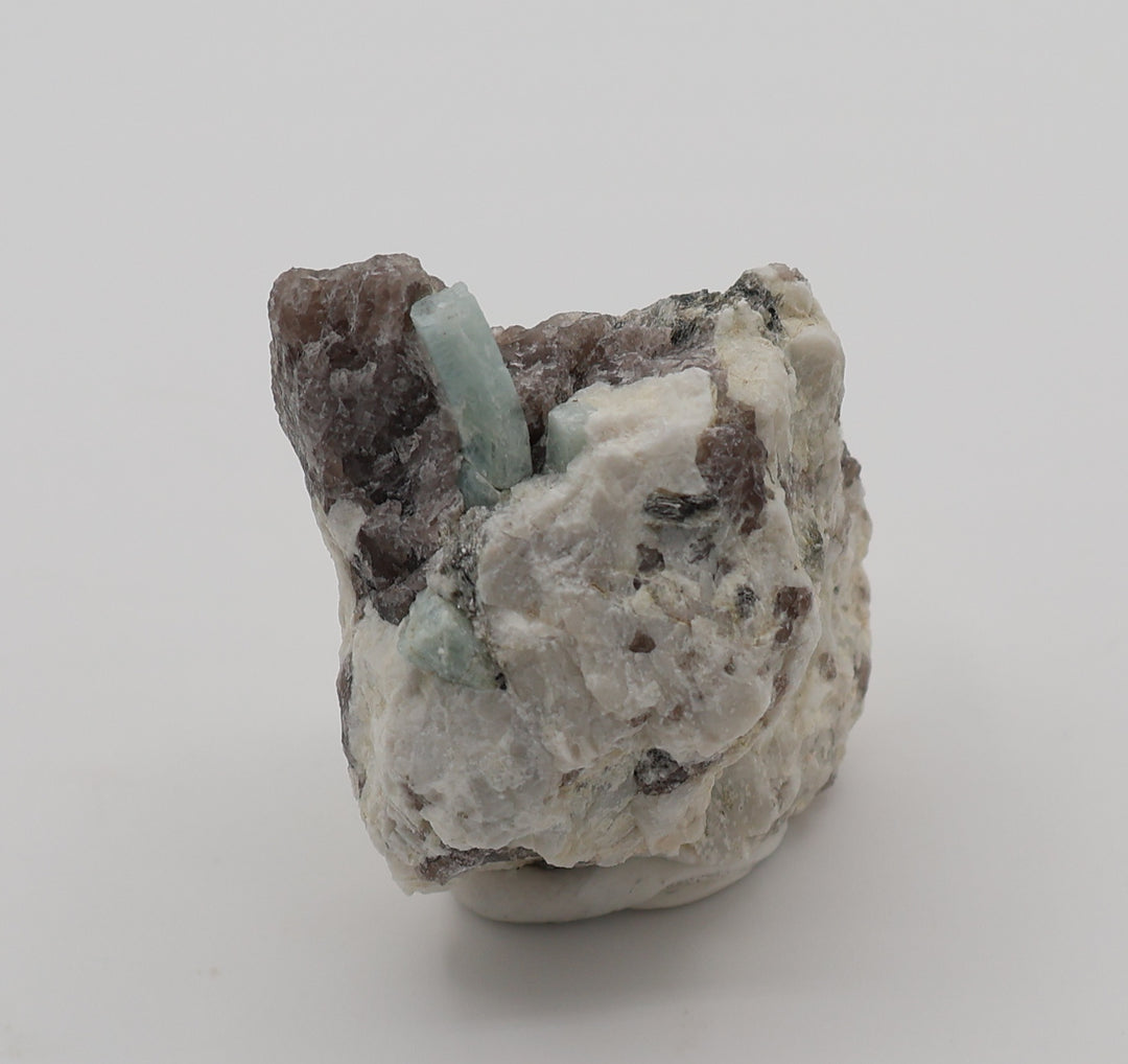 Aquamarine with Mica on Smoky Quartz and Feldspar