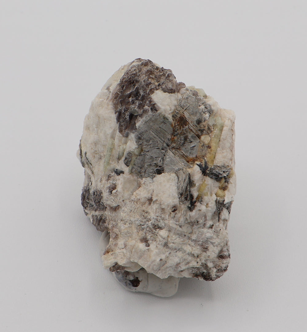 Aquamarine and Heliodor with Mica, Hematite, on Smoky Quartz and Feldspar