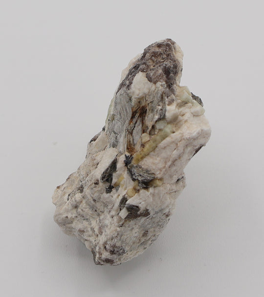 Aquamarine and Heliodor with Mica, Hematite, on Smoky Quartz and Feldspar