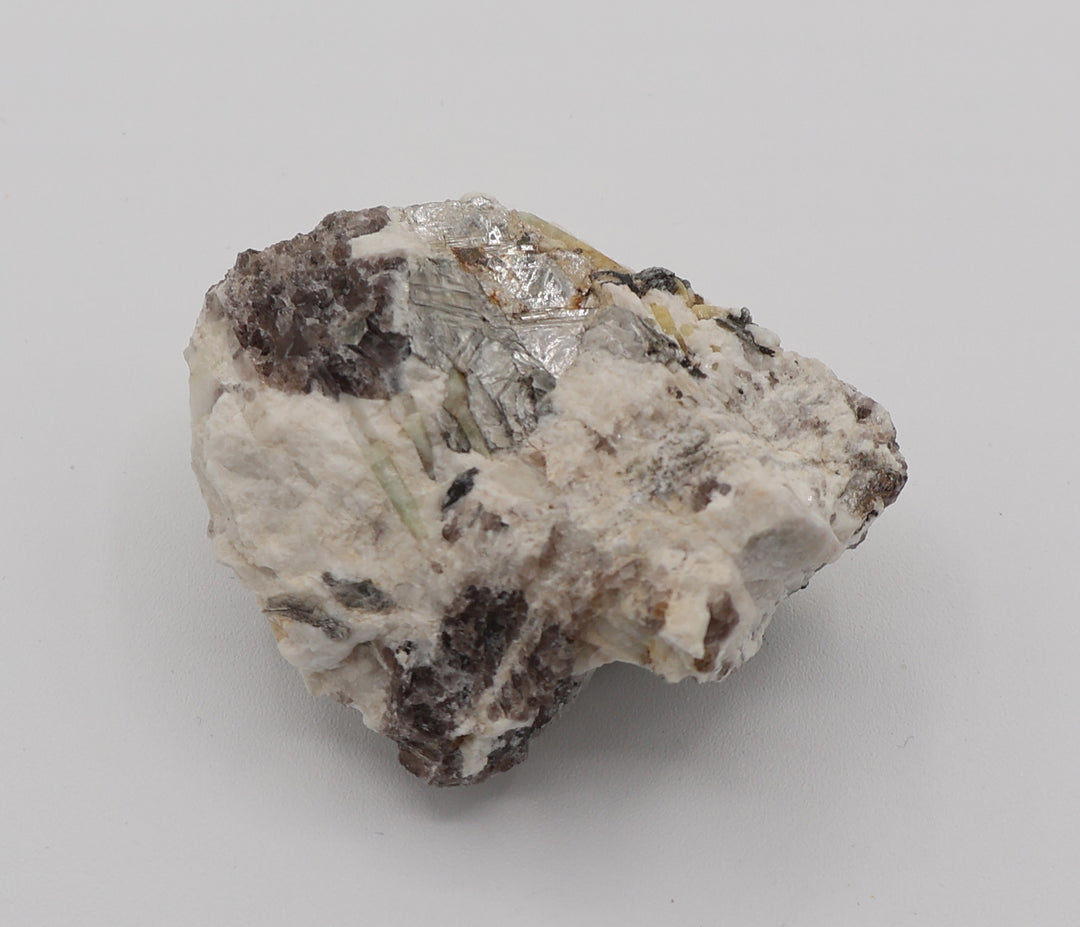 Aquamarine and Heliodor with Mica, Hematite, on Smoky Quartz and Feldspar