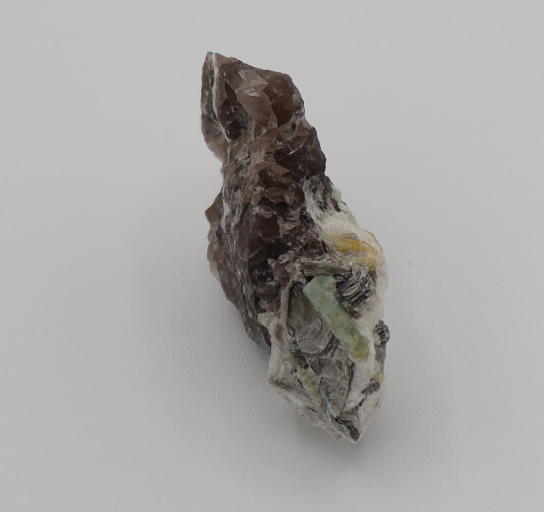 Aquamarine and Heliodor with Mica on Smoky Quartz and Feldspar