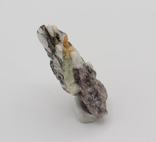 Heliodor Capped Aquamarine with Heliodor, Mica, Hematite, on Smoky Quartz and Feldspar