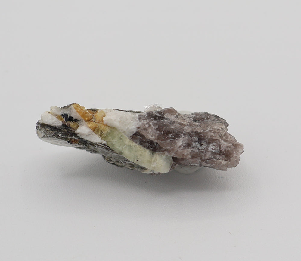 Heliodor Capped Aquamarine with Heliodor, Mica, Hematite, on Smoky Quartz and Feldspar