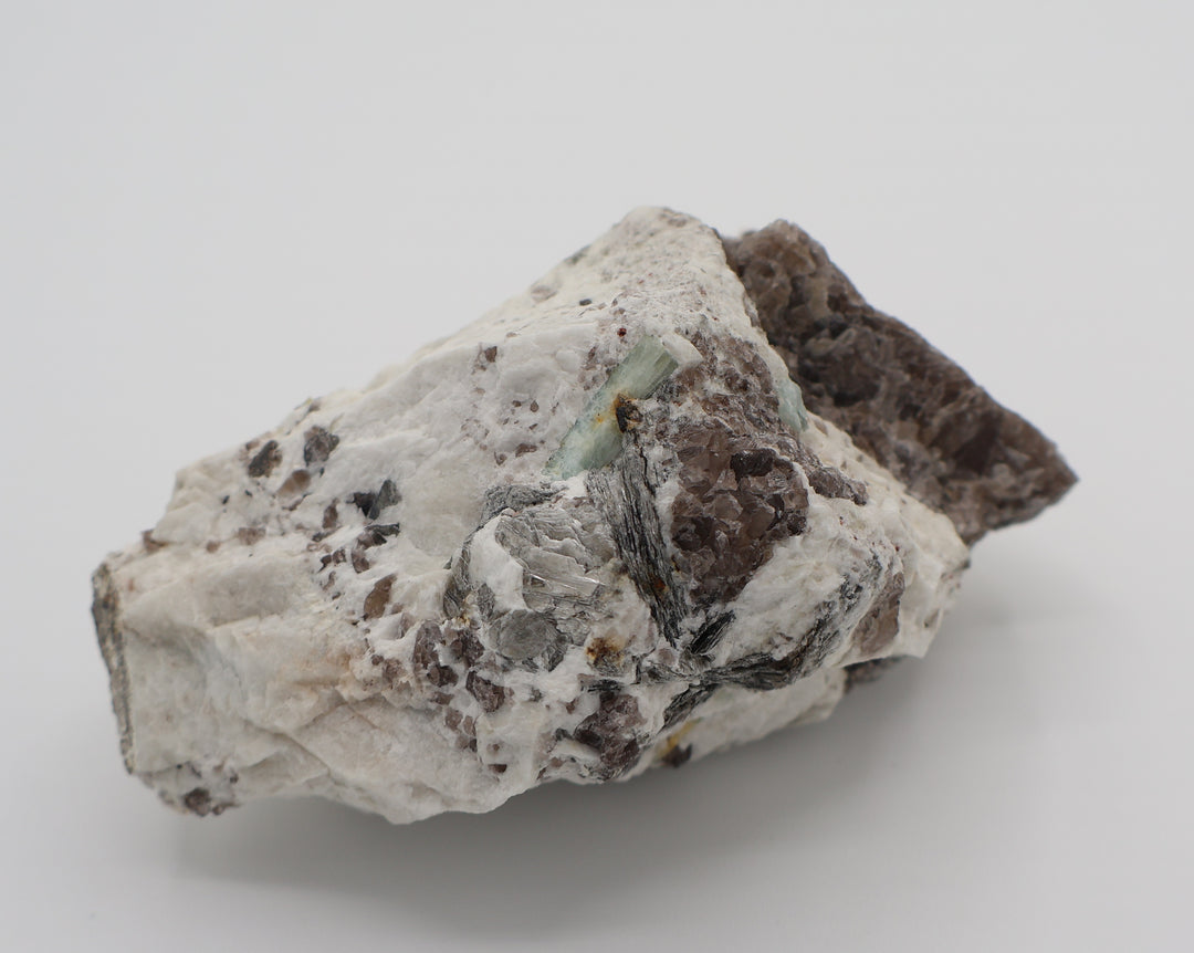 Aquamarine and Bi-Colour Beryl with Mica on Smoky Quartz and Feldspar