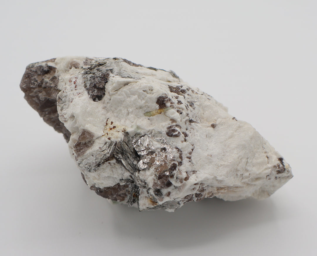 Aquamarine and Bi-Colour Beryl with Mica on Smoky Quartz and Feldspar