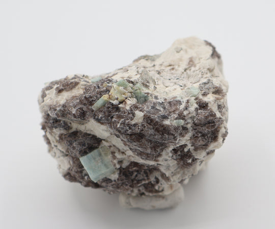 Aquamarine and Bi-Colour Beryl Cluster on Smoky Quartz and Feldspar