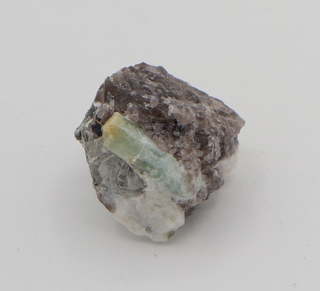 Heliodor Capped Aquamarine with Mica, Hematite, on Smoky Quartz and Feldspar