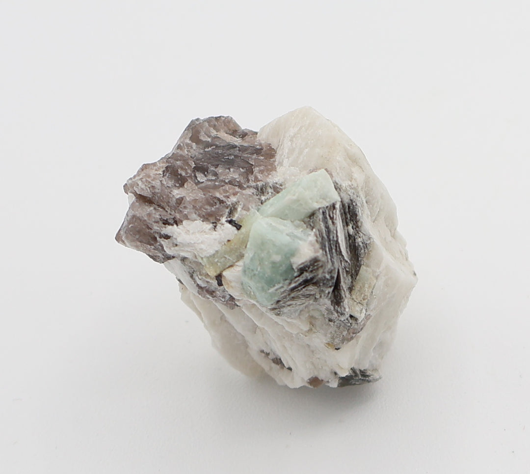 Aquamarine with Mica, Hematite, on Smoky Quartz and Feldspar